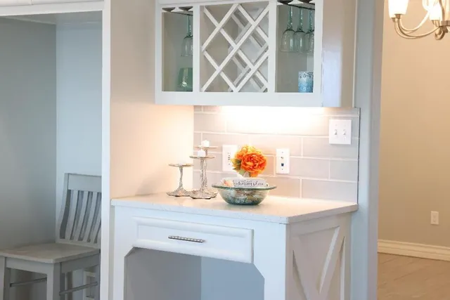 a kitchen with a sink and a window
