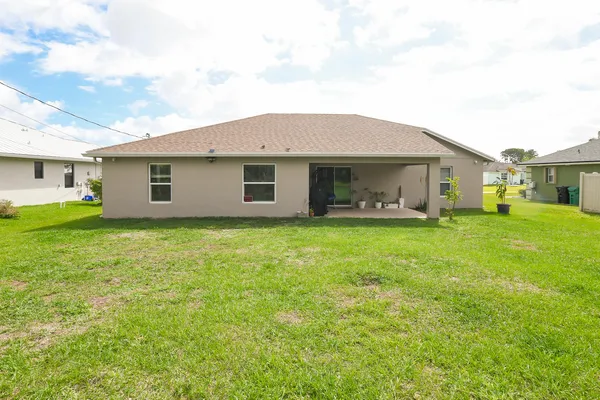 a front view of house with yard