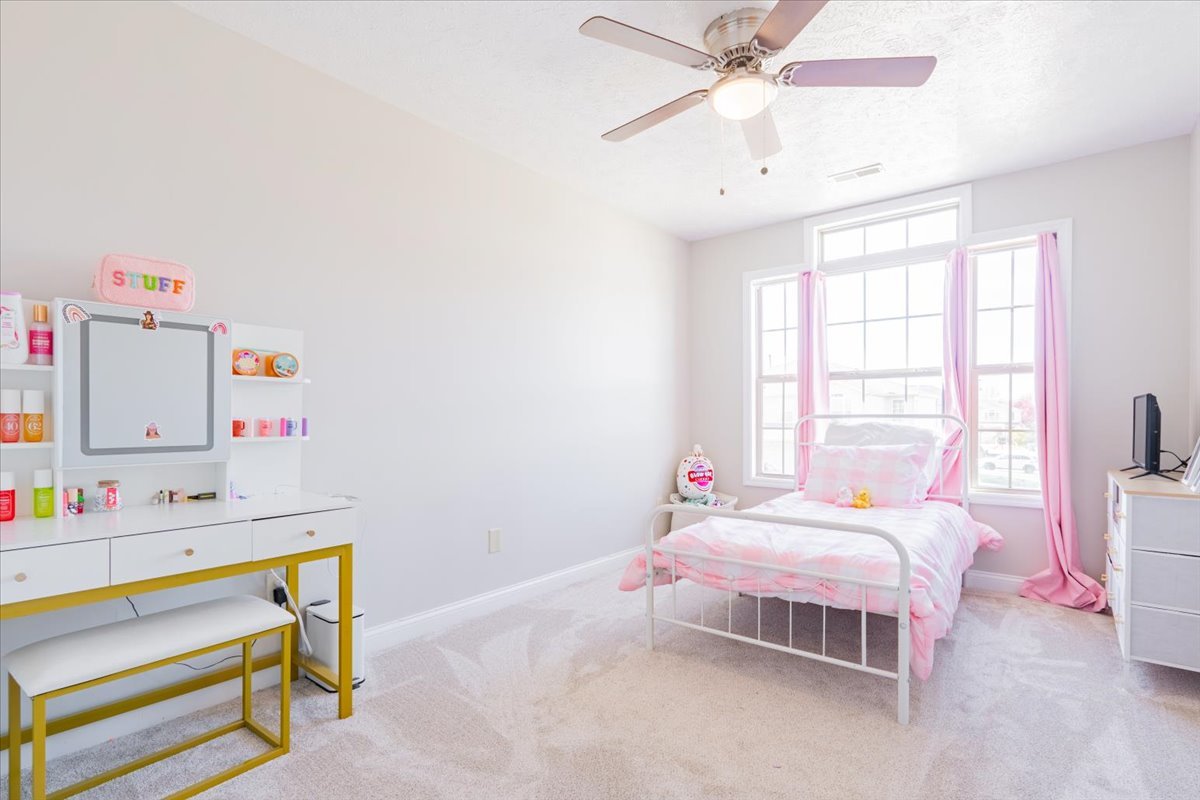 1236 Blue Bill Way Normal, IL 61761 - Photo 18 of 38 a bedroom with a bed and a window