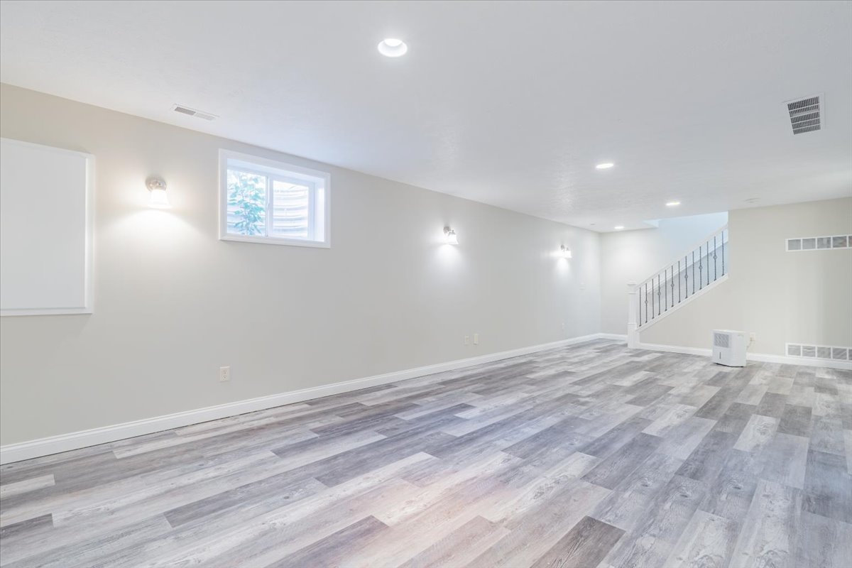1236 Blue Bill Way Normal, IL 61761 - Photo 25 of 38 a view of empty room with wooden floor