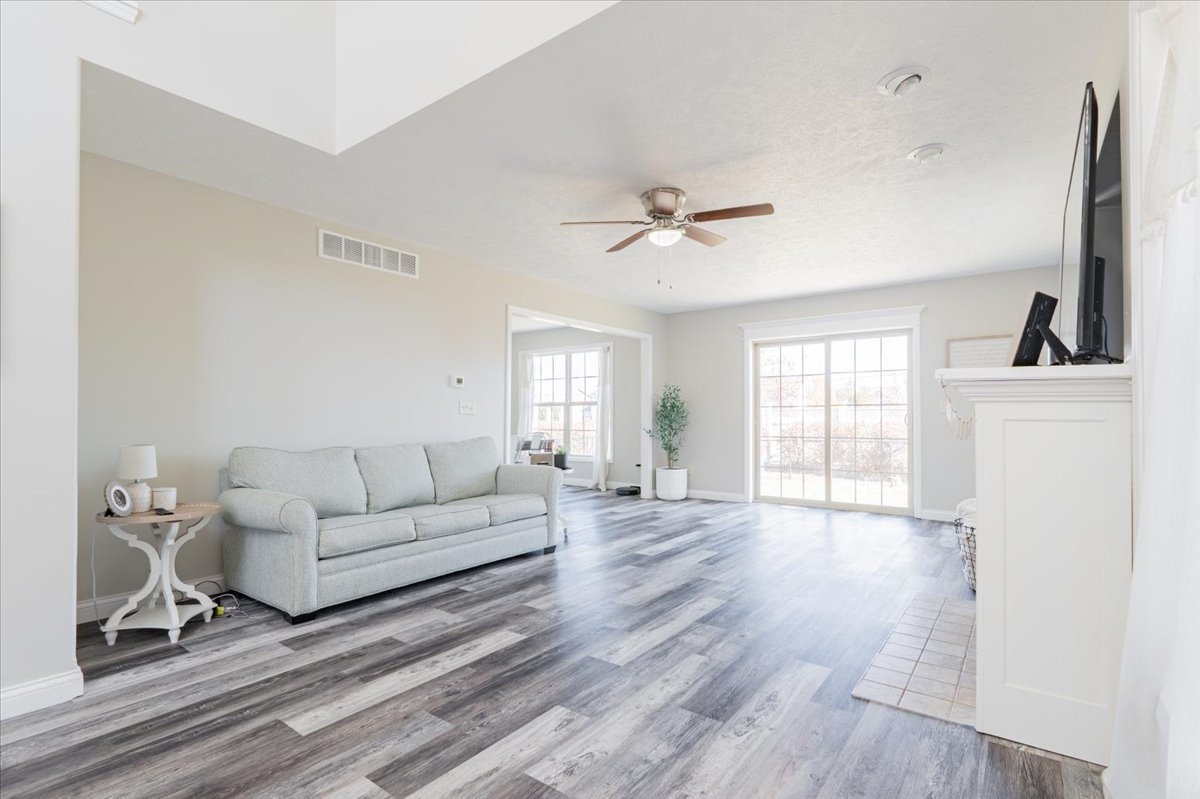 1236 Blue Bill Way Normal, IL 61761 - Photo 3 of 38 a living room with furniture and a window