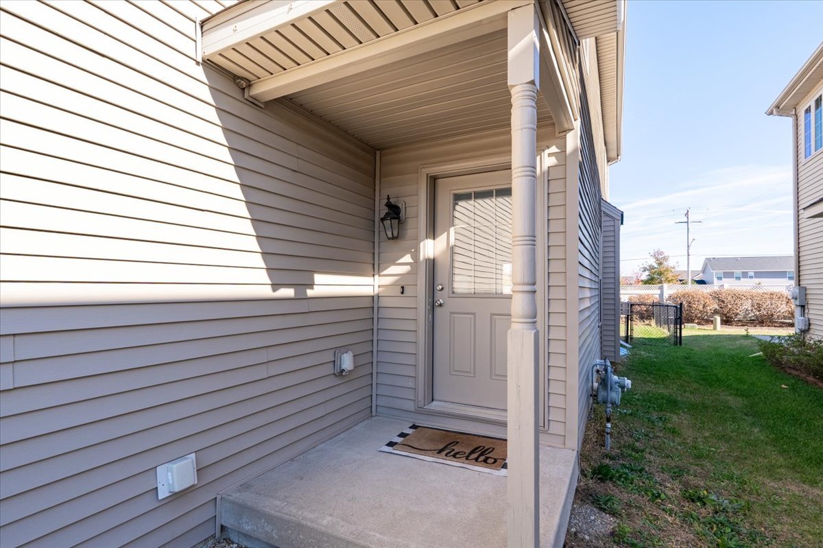 1236 Blue Bill Way Normal, IL 61761 - Photo 36 of 38 a view of backyard with barbeque grill and a wooden fence