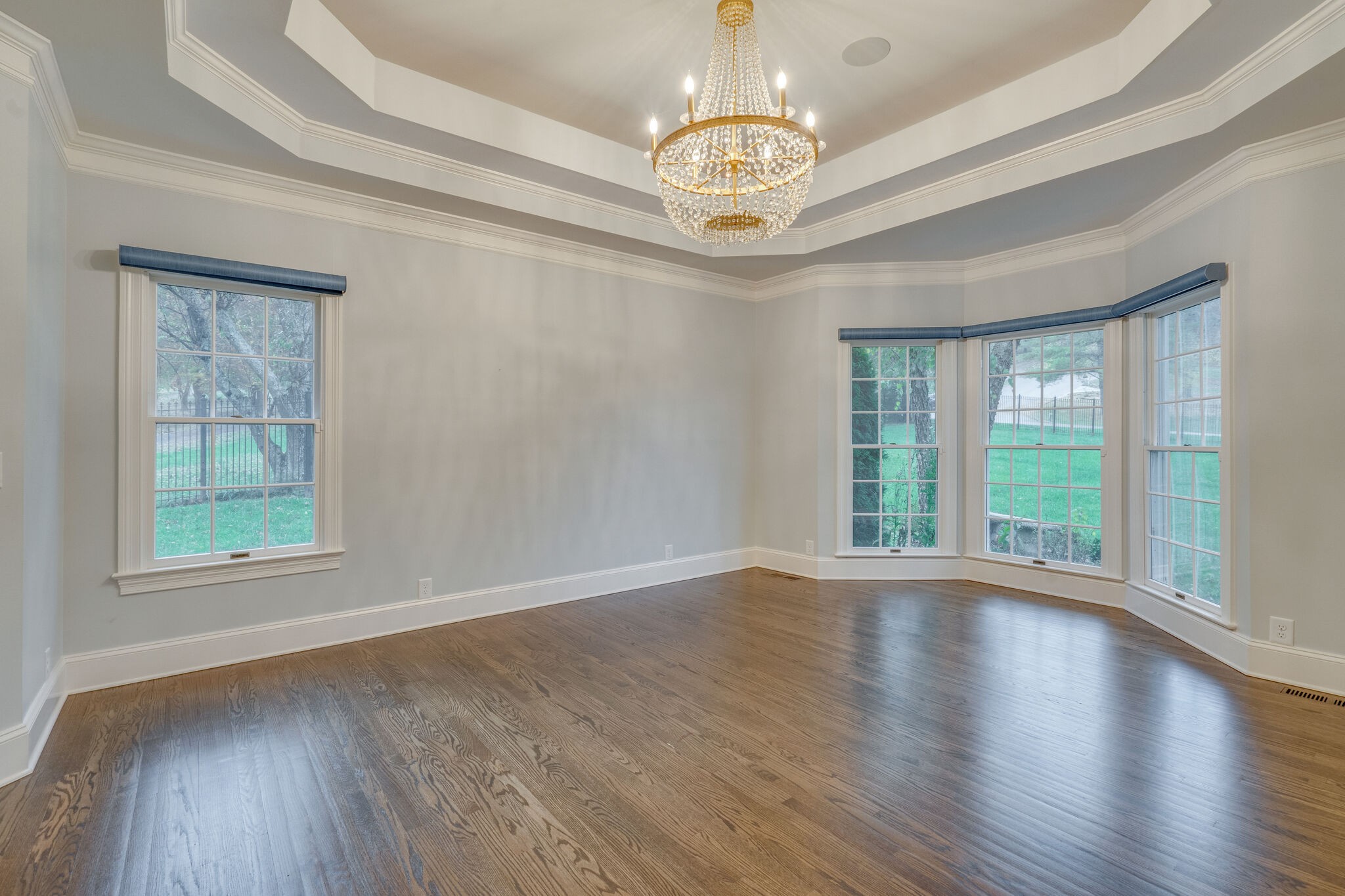 747 High Point Ridge Road Franklin, TN 37069 - Photo 15 of 38 a view of an empty room with wooden floor and a window