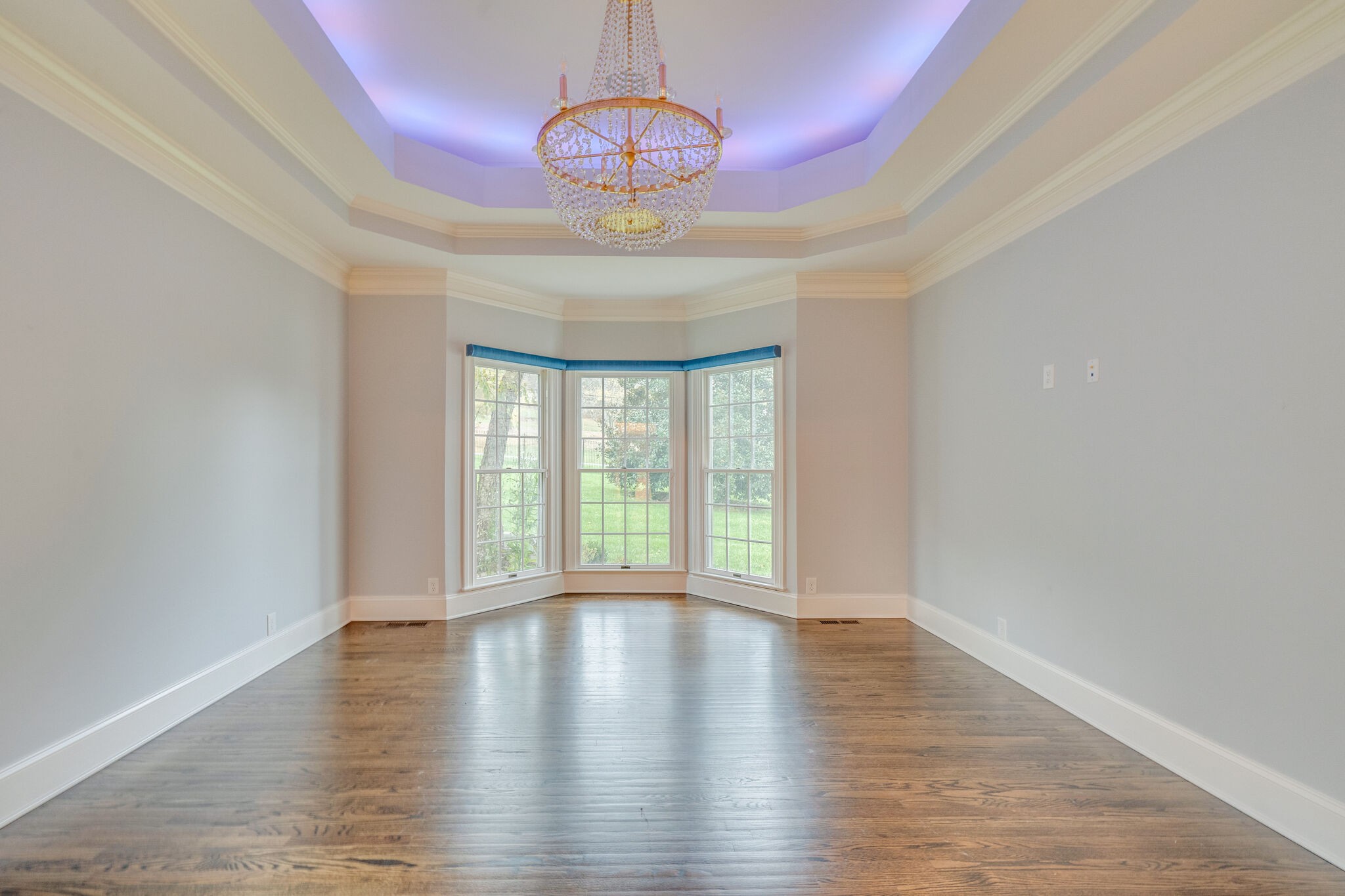 747 High Point Ridge Road Franklin, TN 37069 - Photo 16 of 38 a view of an empty room with wooden floor and a window
