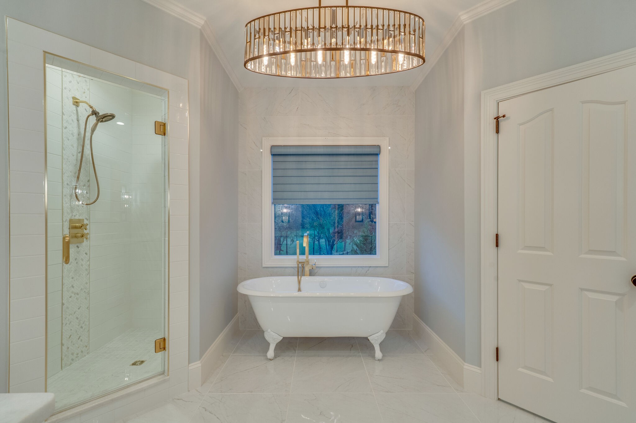 747 High Point Ridge Road Franklin, TN 37069 - Photo 17 of 38 a bathroom with a tub and a shower