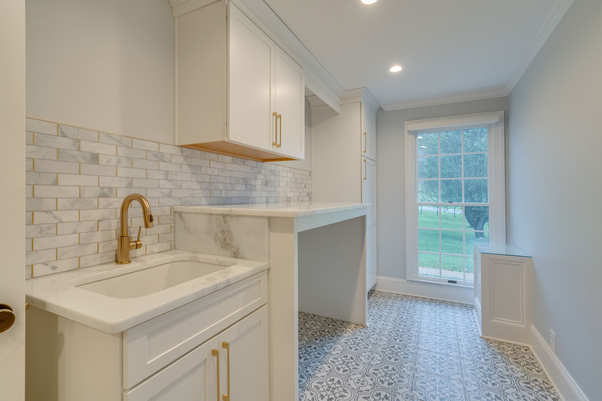 747 High Point Ridge Road Franklin, TN 37069 - Photo 21 of 38 a kitchen with a sink cabinets and appliances