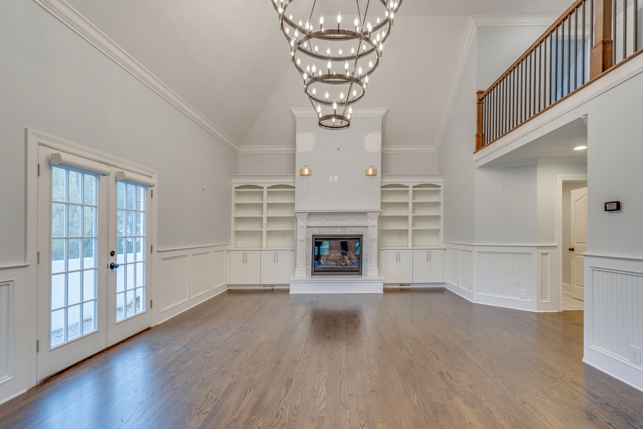 747 High Point Ridge Road Franklin, TN 37069 - Photo 23 of 38 a view of a livingroom with wooden floor a fireplace and window