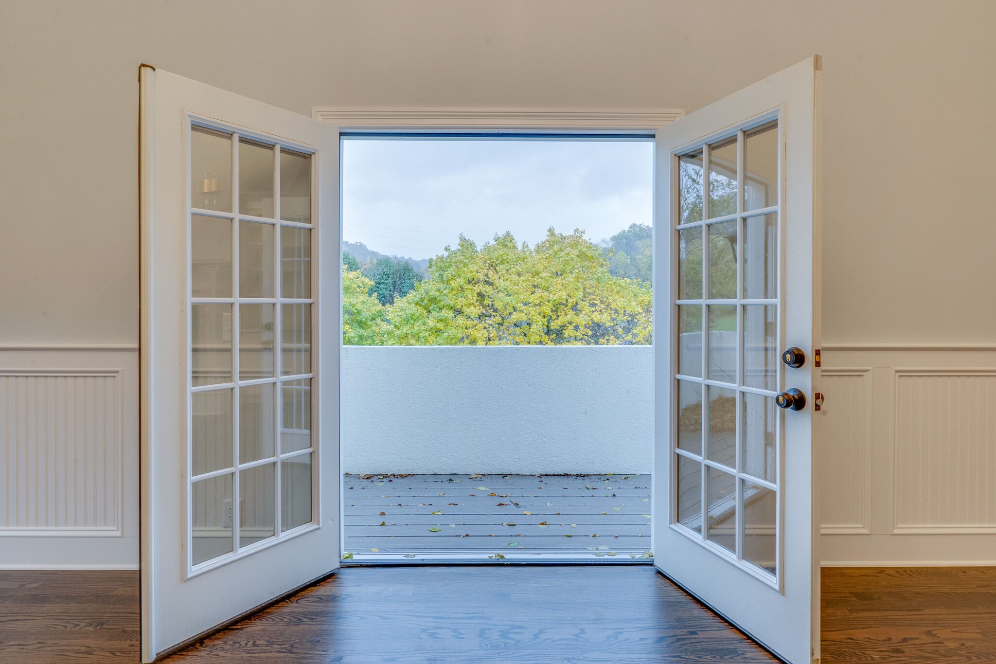 747 High Point Ridge Road Franklin, TN 37069 - Photo 24 of 38 an empty room with wooden floor and windows