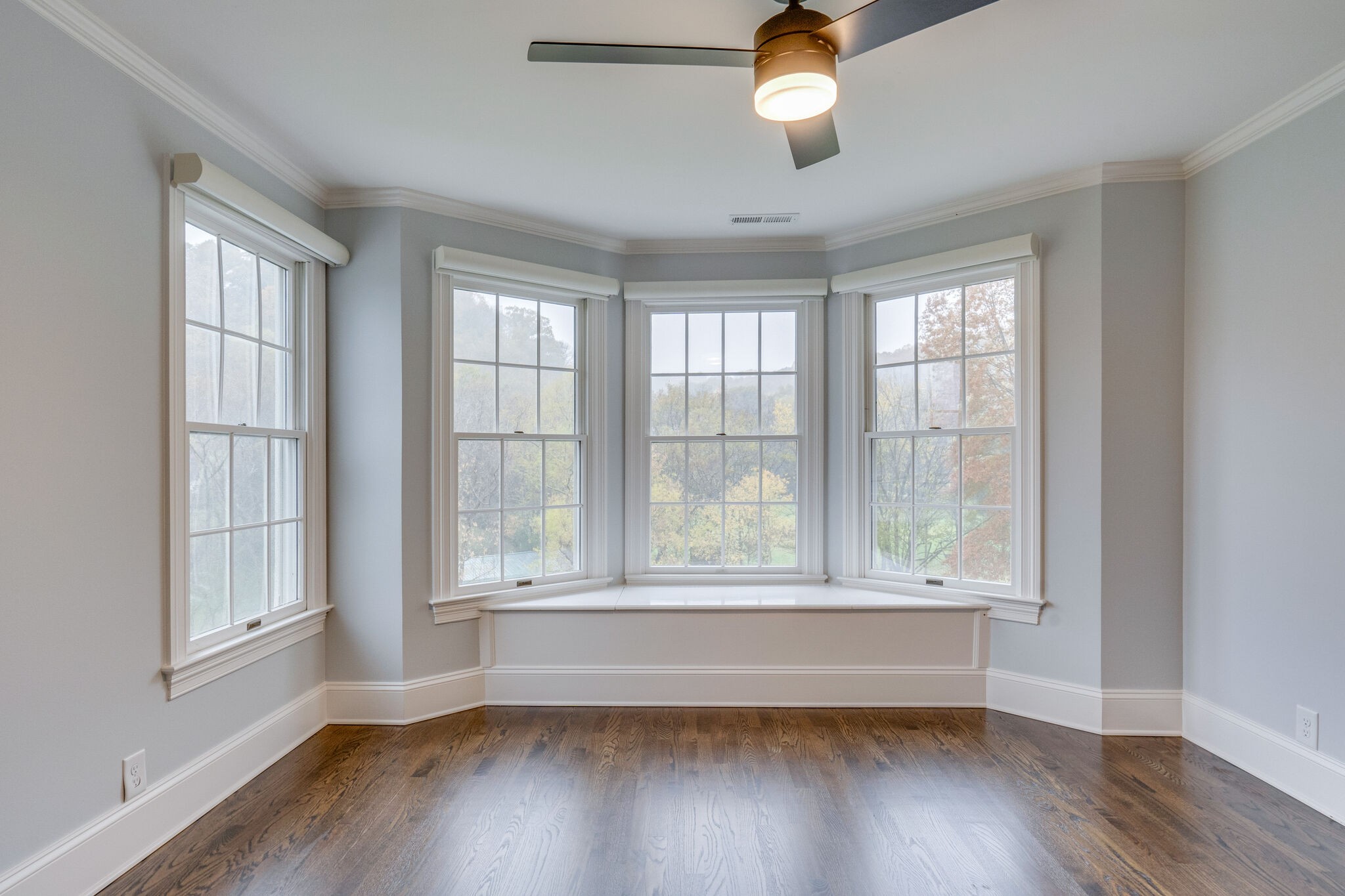 747 High Point Ridge Road Franklin, TN 37069 - Photo 30 of 38 an empty room with wooden floor and windows