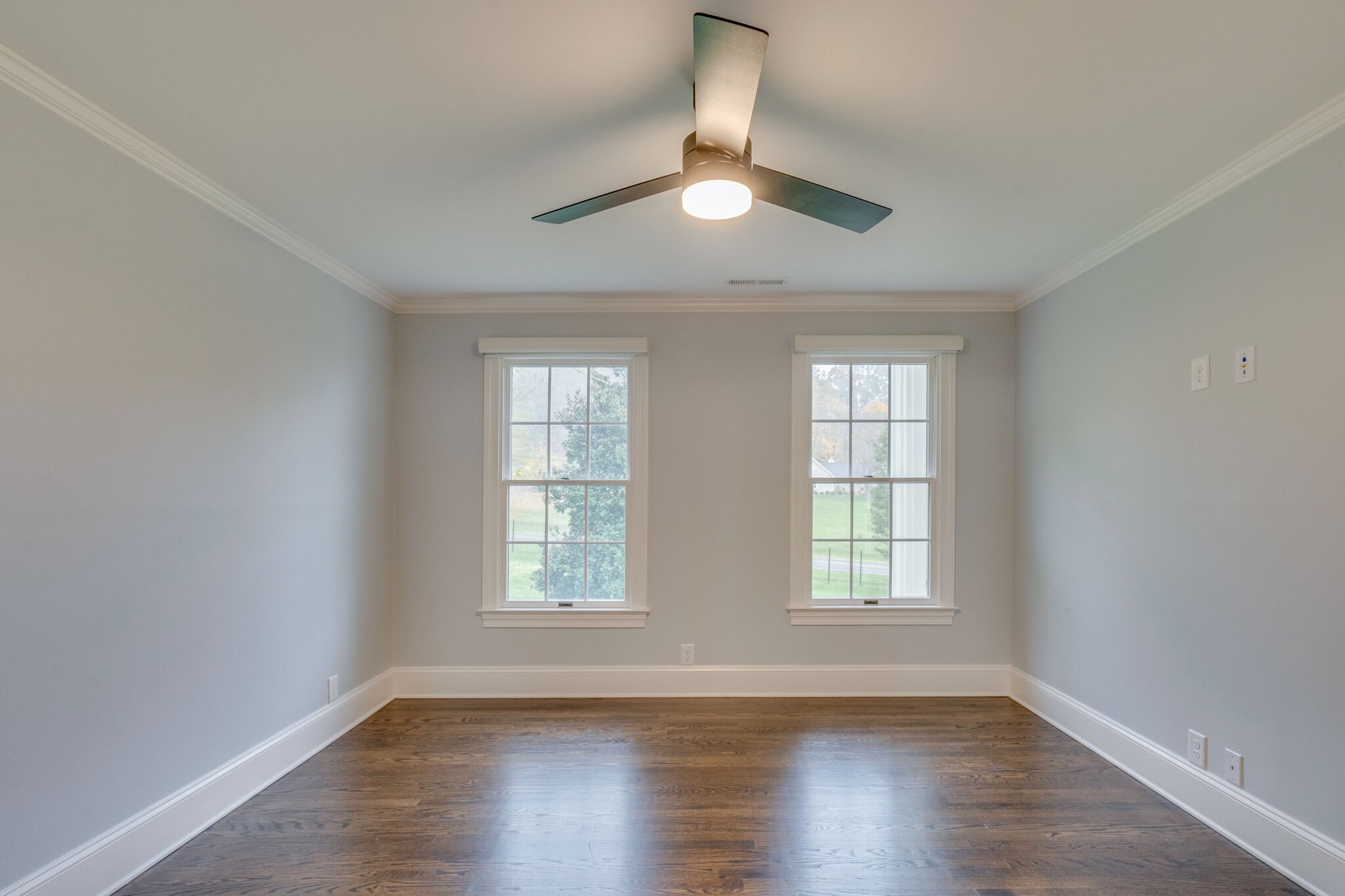 747 High Point Ridge Road Franklin, TN 37069 - Photo 32 of 38 an empty room with wooden floor and windows
