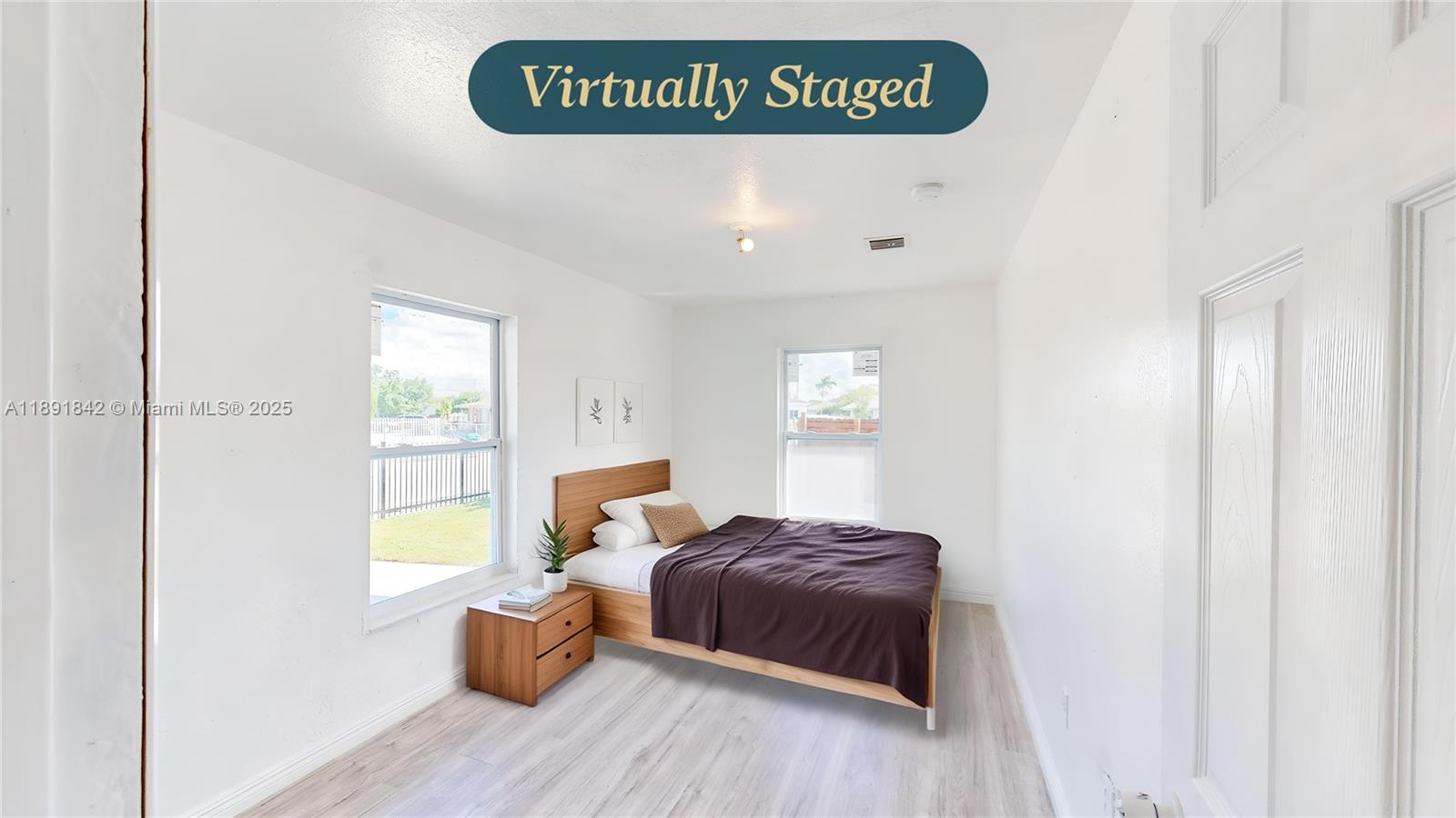 22230 Southwest 115th Court Miami, FL 33170 - Photo 12 of 63 a view of bedroom with furniture and wooden floor