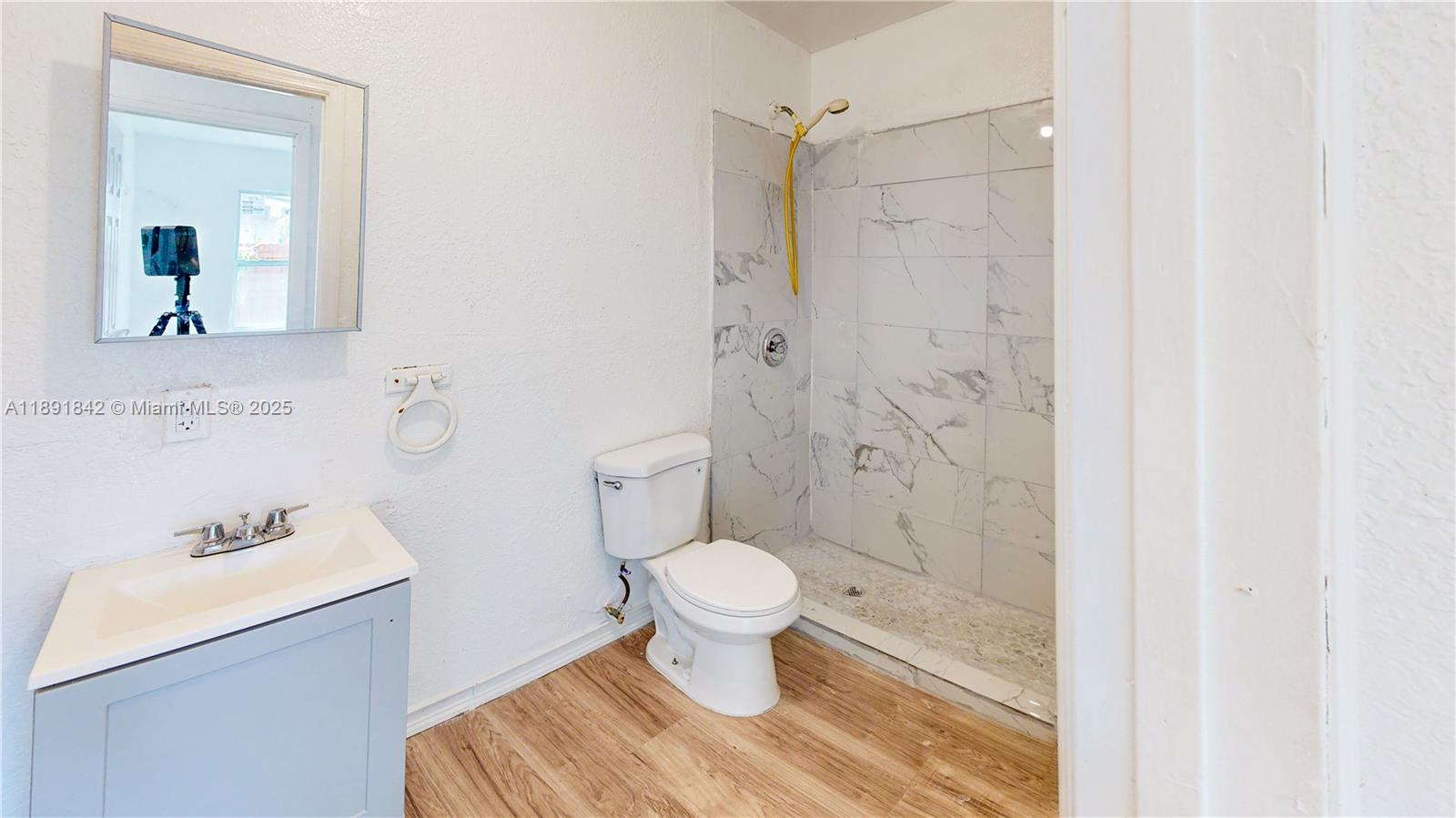 22230 Southwest 115th Court Miami, FL 33170 - Photo 13 of 63 a bathroom with a sink toilet and shower