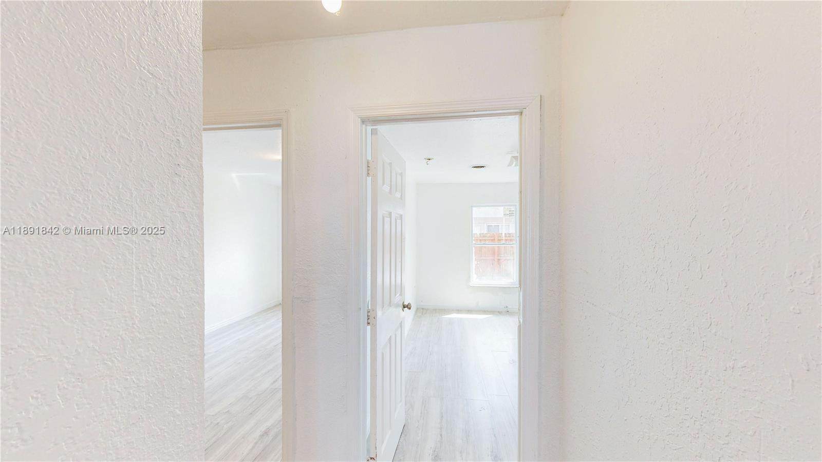 22230 Southwest 115th Court Miami, FL 33170 - Photo 14 of 63 a view of a bathroom with a shower curtain