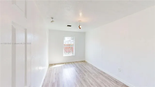a bathroom with a toilet and a bathtub