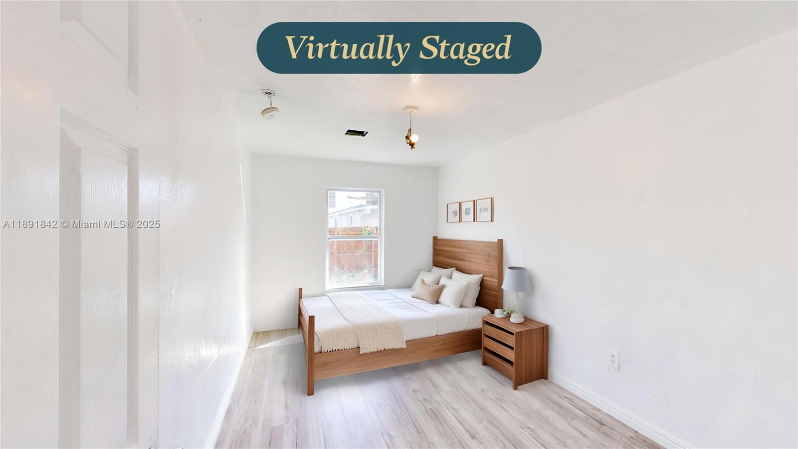 22230 Southwest 115th Court Miami, FL 33170 - Photo 33 of 63 a bedroom with a bed and a window