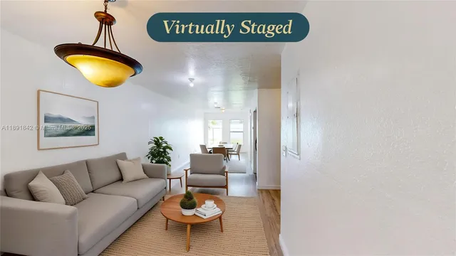 a front view of a house with a yard and a garage