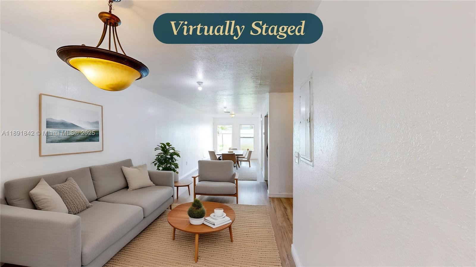 22230 Southwest 115th Court Miami, FL 33170 - Photo 39 of 63 a living room with furniture and floor to ceiling window