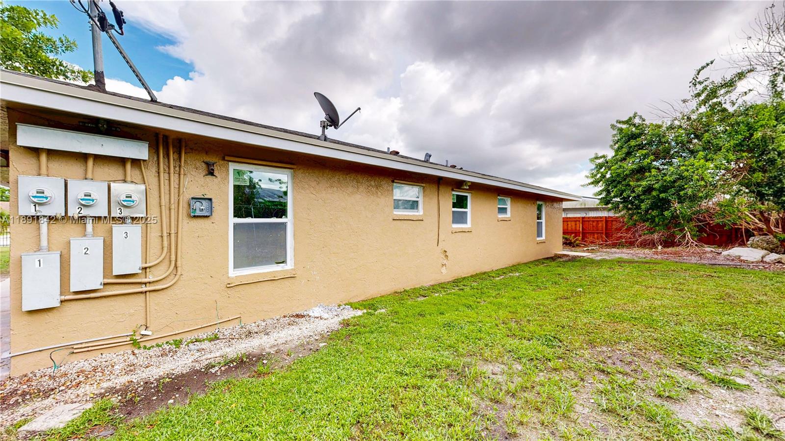 22230 Southwest 115th Court Miami, FL 33170 - Photo 52 of 63 a front view of house with yard