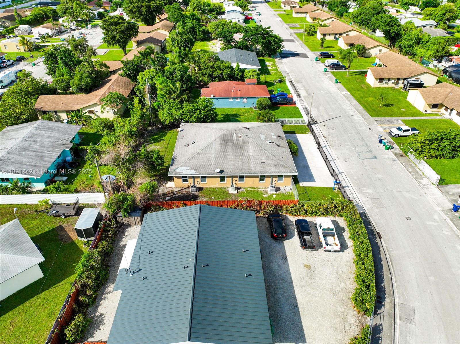 22230 Southwest 115th Court Miami, FL 33170 - Photo 57 of 63 an aerial view of a house with yard swimming pool and outdoor seating