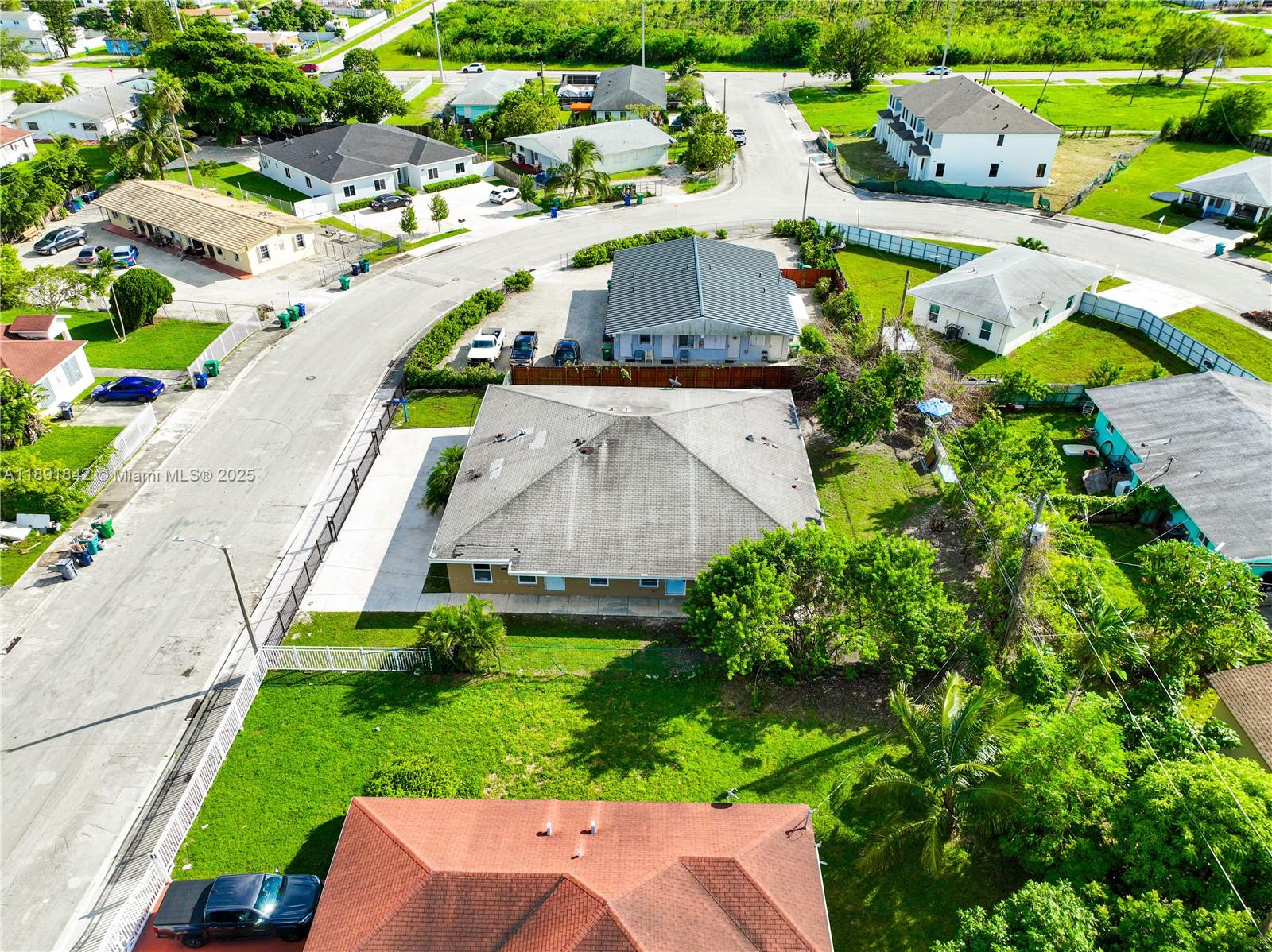 22230 Southwest 115th Court Miami, FL 33170 - Photo 62 of 63 an aerial view of a house with a garden