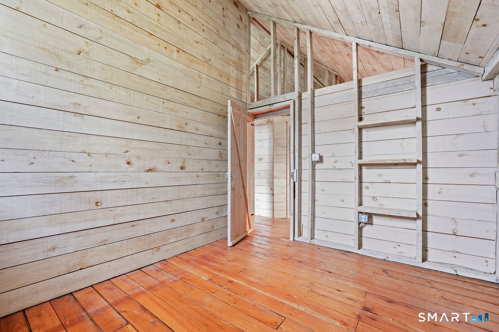 88 Powder Hill Road Middlefield, CT 06455 - Photo 30 of 40 a view of a small space built with hardwood
