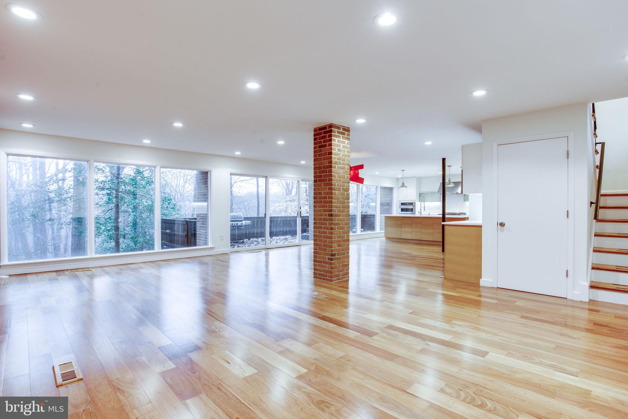 1013 Gelston Circle McLean, VA 22102 - Photo 5 of 33 Lower level living space w/entire wall of windows
