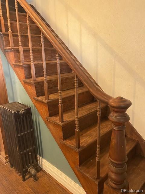 326 Cedar Street Wray, CO 80758 - Photo 16 of 19 a view of balcony with wooden floor and fence