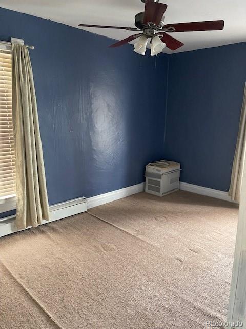 326 Cedar Street Wray, CO 80758 - Photo 19 of 19 a view of a livingroom with a chandelier fan