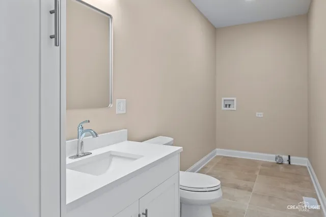 a bathroom with a sink and a toilet