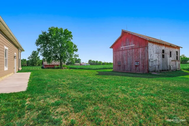 a view of a back yard with green space