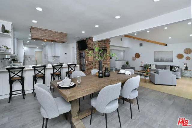 a view of kitchen with wooden floor