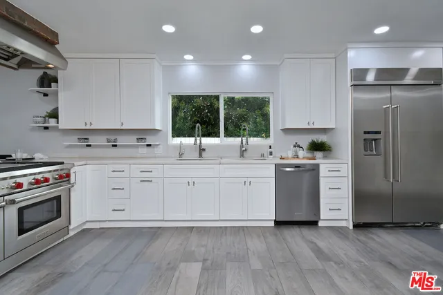 a view of a workspace with furniture