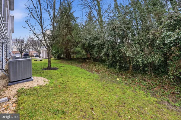 a view of a backyard with a small cabin