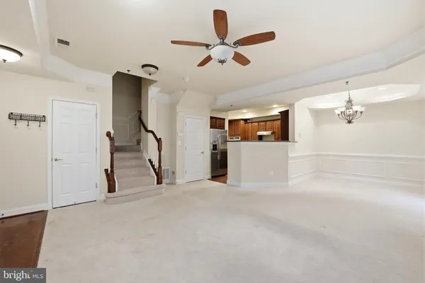 a view of a livingroom with a ceiling fan