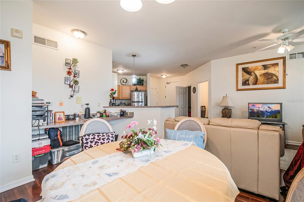 612 Terrace Ridge Circle, Unit 612 Davenport, FL 33896 - Photo 21 of 45 a bedroom with furniture and a wooden floor