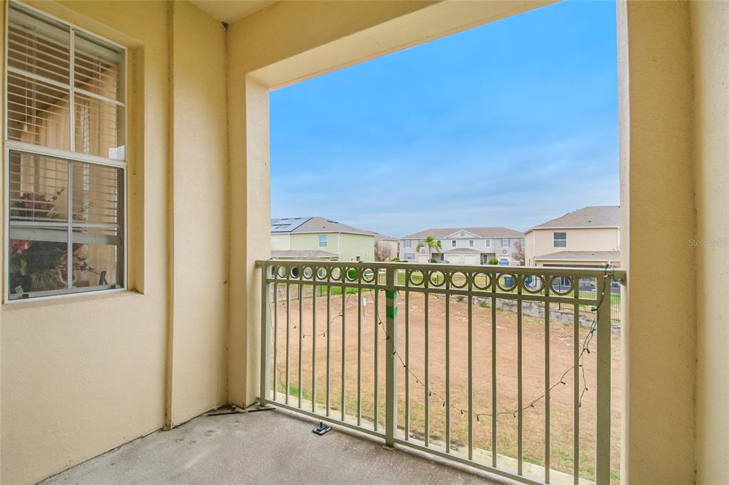 612 Terrace Ridge Circle, Unit 612 Davenport, FL 33896 - Photo 26 of 45 a view of a balcony with city view