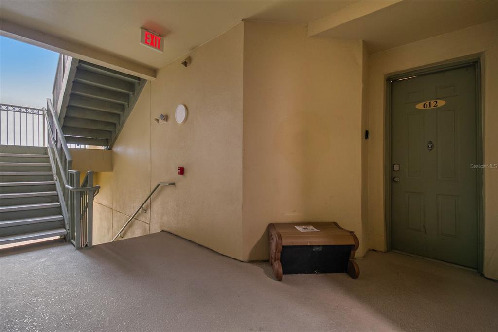 612 Terrace Ridge Circle, Unit 612 Davenport, FL 33896 - Photo 28 of 45 a view of a livingroom with a staircase