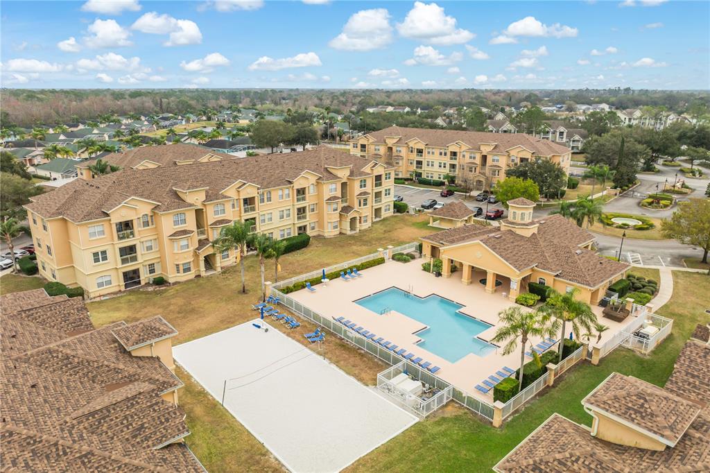 612 Terrace Ridge Circle, Unit 612 Davenport, FL 33896 - Photo 32 of 45 an aerial view of residential houses with outdoor space and ocean view