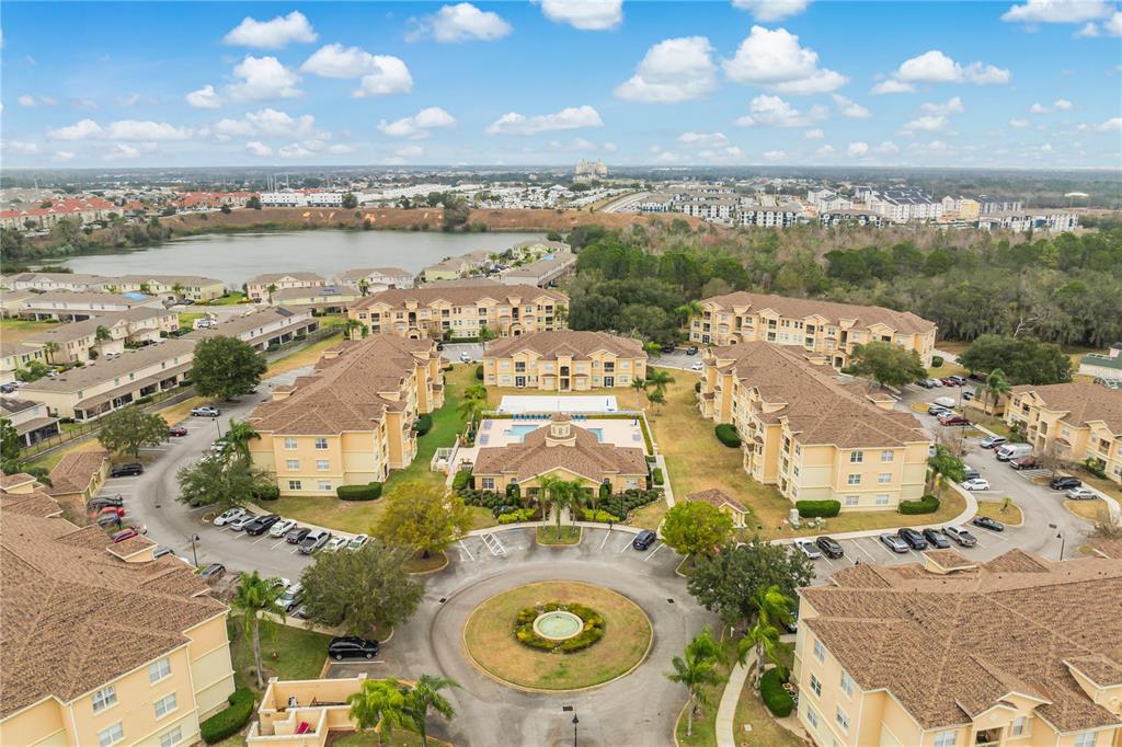 612 Terrace Ridge Circle, Unit 612 Davenport, FL 33896 - Photo 37 of 45 an aerial view of residential building and lake