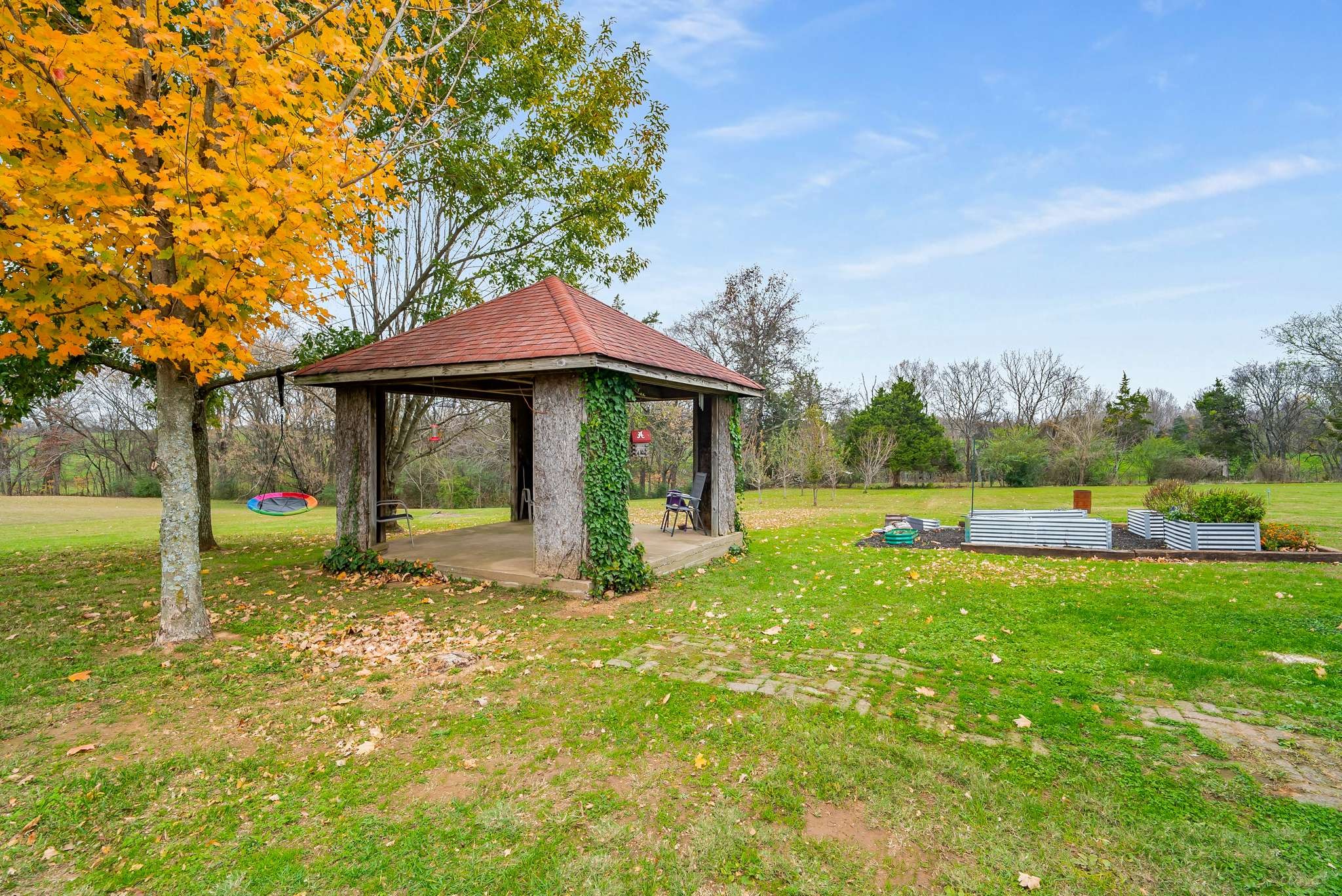 2980 Union Road White House, TN 37188 - Photo 9 of 33 a view of a house with backyard porch and sitting area