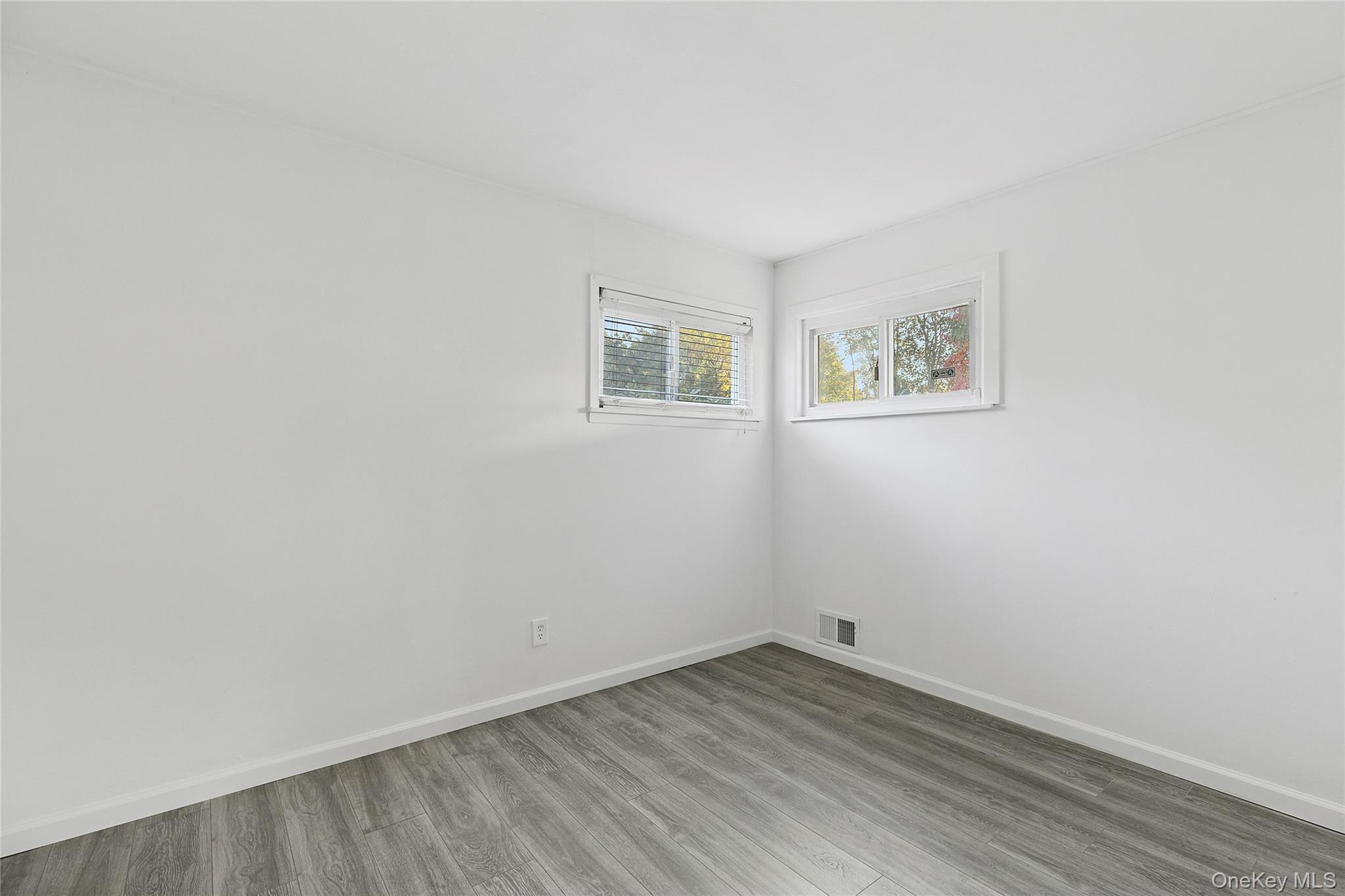 738 Old Town Road Port Jefferson Station, NY 11776 - Photo 22 of 28 wooden floor in an empty room