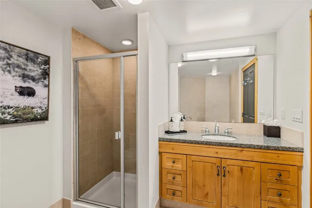 a view of a balcony with chairs