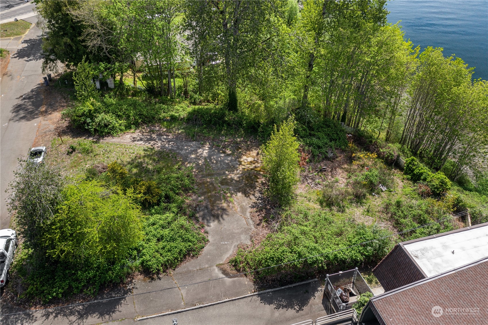 1231 Campbell Way Bremerton, WA 98310 - Photo 19 of 19 a view of a garden with a bench