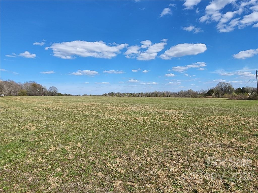 0 Barrett Road, Unit 4 Clover, SC 29710 - Photo 13 of 24 a view of a lake with a city