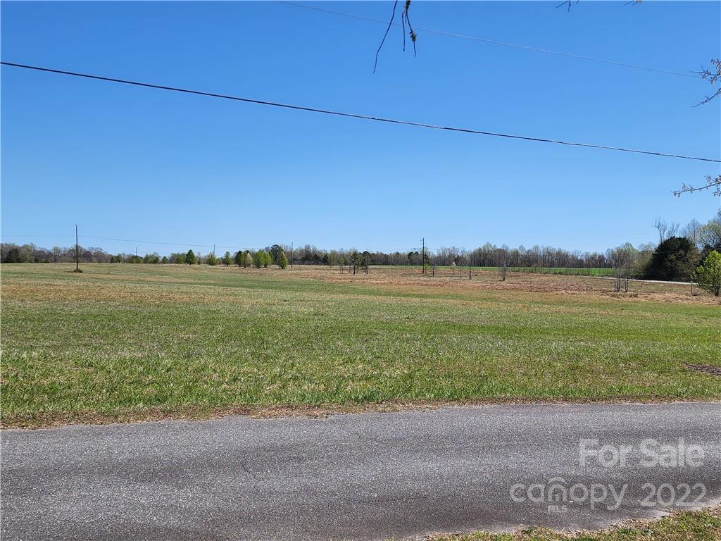 0 Barrett Road, Unit 4 Clover, SC 29710 - Photo 17 of 24 a view of a lake with a city view