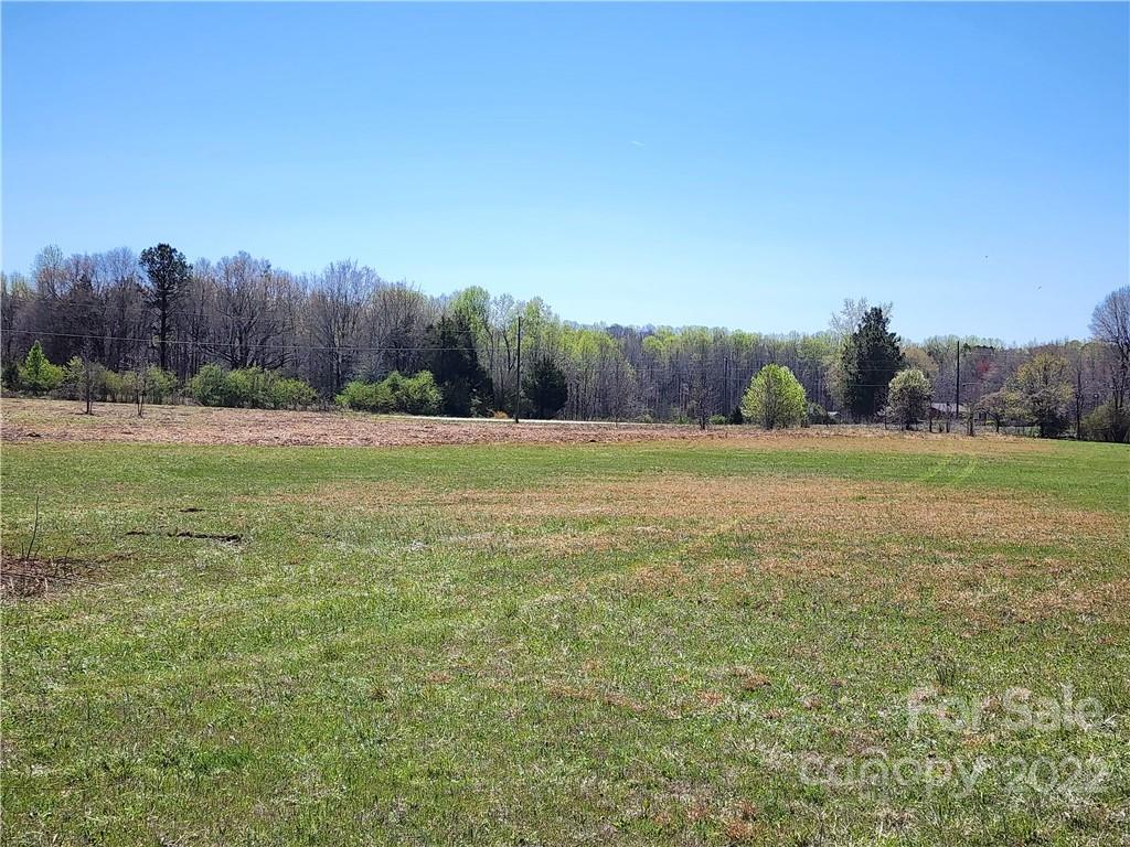 0 Barrett Road, Unit 4 Clover, SC 29710 - Photo 18 of 24 a view of a field with trees in the background