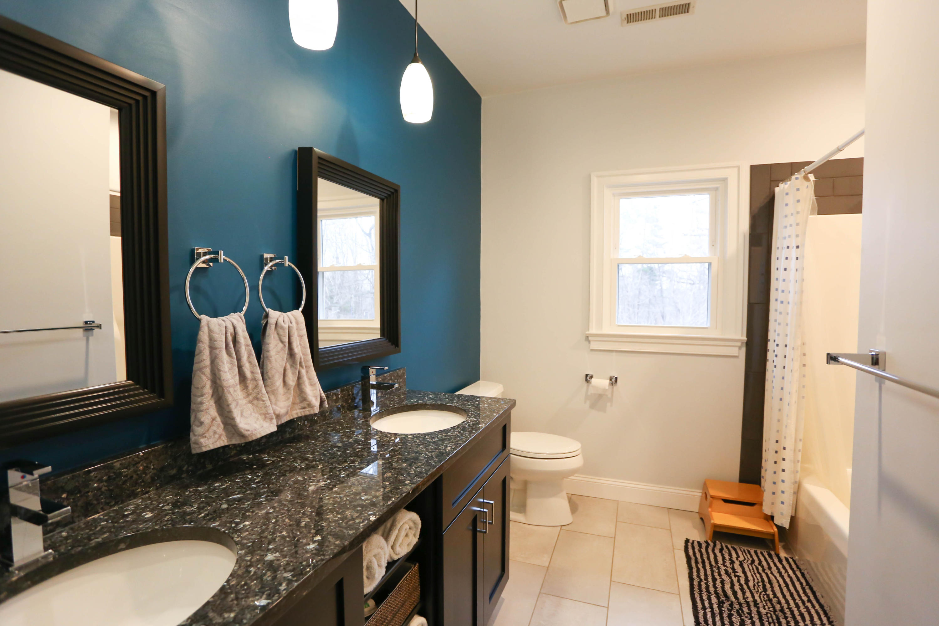 6715 Fairway Ridge Road Roanoke, VA 24018 - Photo 21 of 35 a bathroom with a granite countertop sink and a mirror