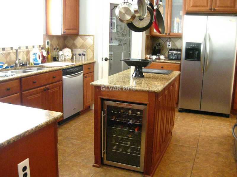 188 Reed Lane Henderson, NV 89074 - Photo 9 of 19 Property Photo. Island with Wine Refrigerator