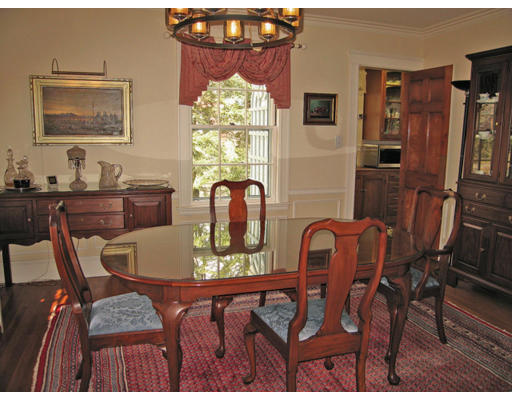 54 Gammons Road Newton, MA 02468 - Photo 3 of 9 a view of a dining room with furniture and chandelier