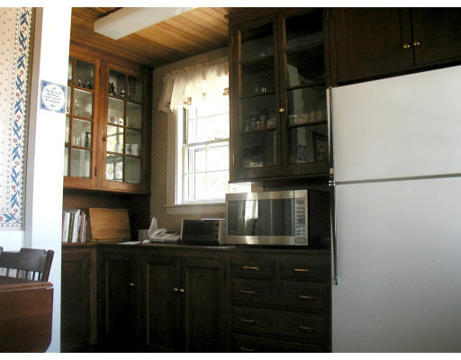 54 Gammons Road Newton, MA 02468 - Photo 6 of 9 a kitchen with a refrigerator and a sink